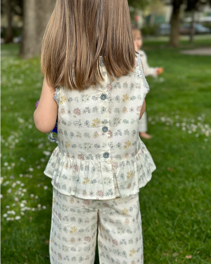 blusa sin mangas volante flores organic