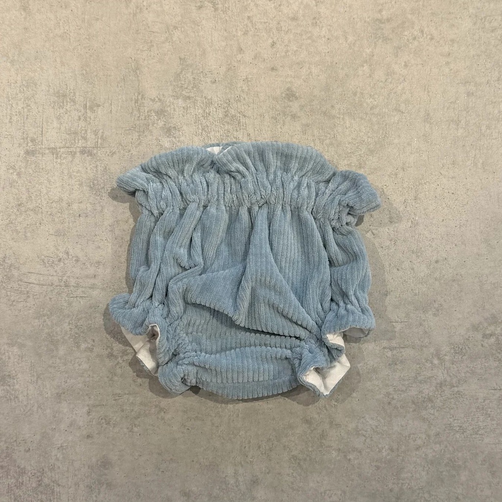 Cubrepañal pana azul